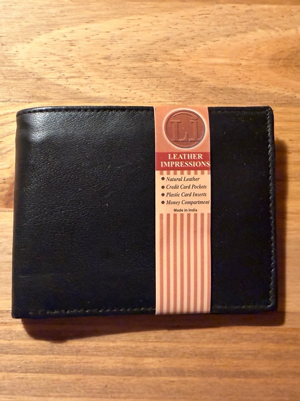 Impressions Men's Black Leather Wallet with Tan Label Accent